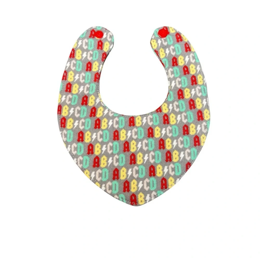 Hand Crafted Newborn Bandana Bib with snap closure ABCD red yellow blue letters